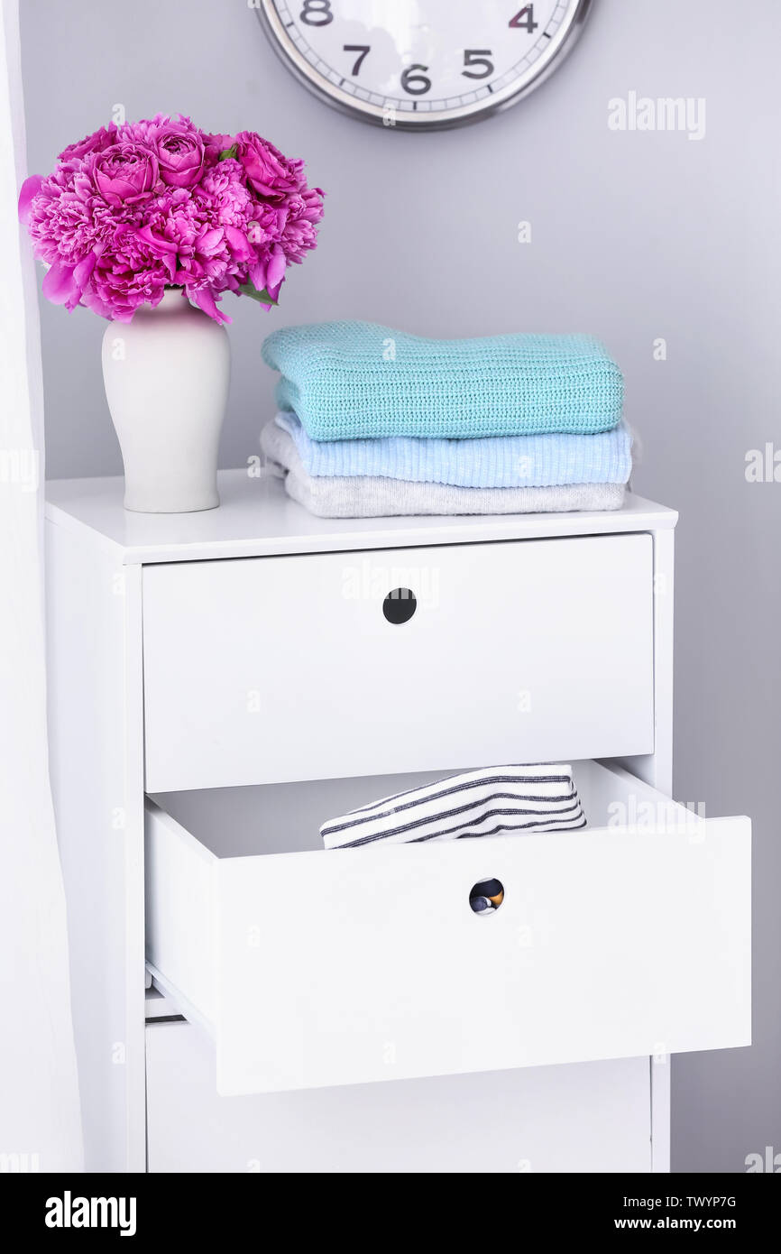 Chest of drawers with clean clothes at home Stock Photo Alamy