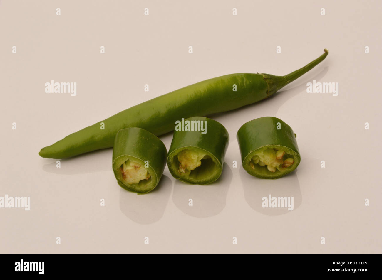 Fresh green chili, whole and sliced green chili, hot and spicy green