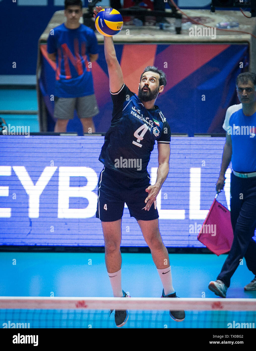 Ardabil, Iran. 23rd June, 2019. Mir Saeid Marouflakrani of Iran spikes the  ball during the FIVB Volleyball Nations League match between Iran and  France in Ardabil, Iran, June 23, 2019. France won