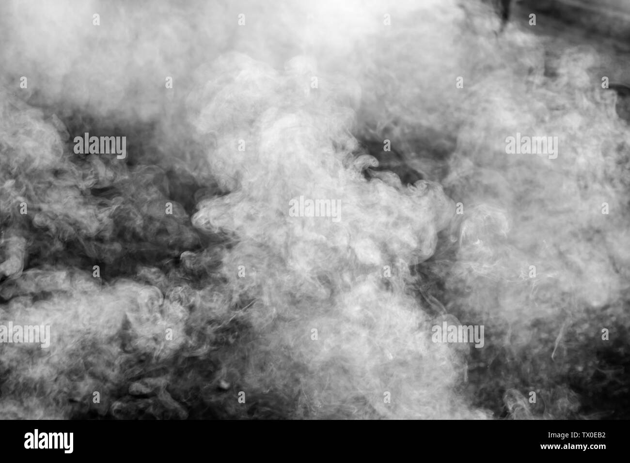 Abstract white smoke on black background.White smoke cloud. Stock Photo