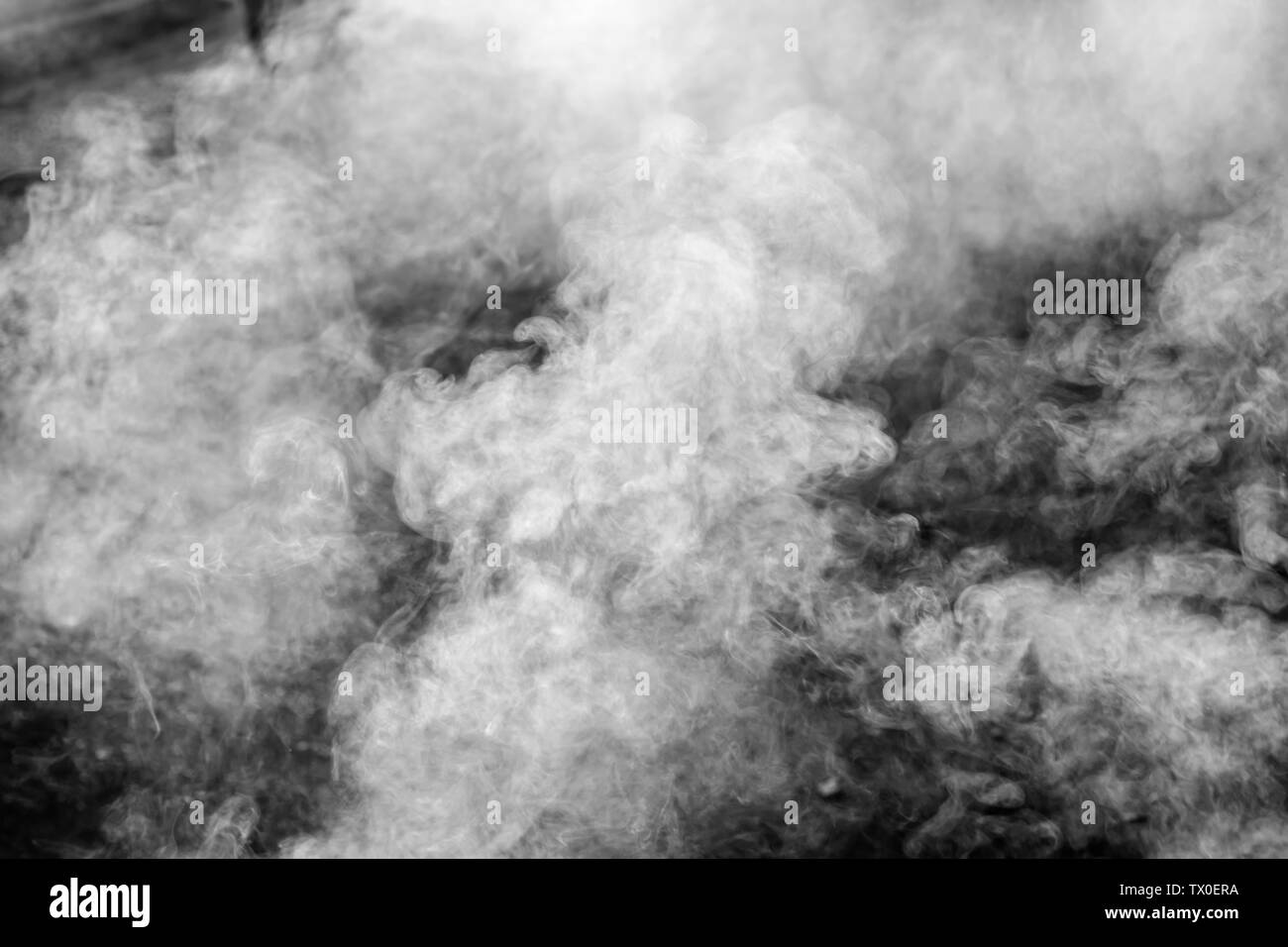 Abstract white smoke on black background.White smoke cloud. Stock Photo