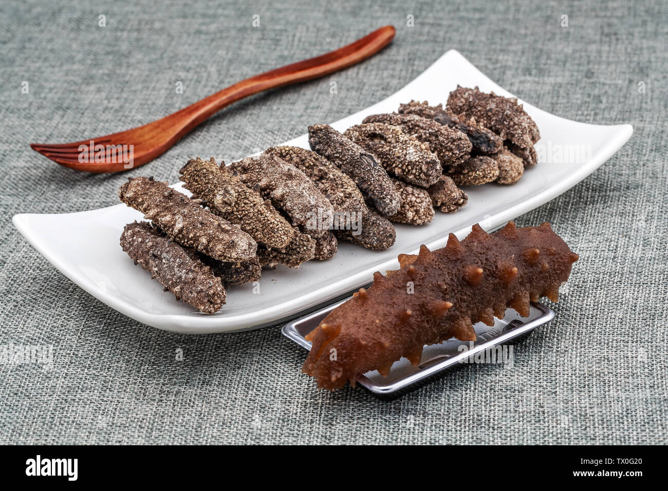 Dried sea cucumber and waterborne sea cucumber Stock Photo Alamy
