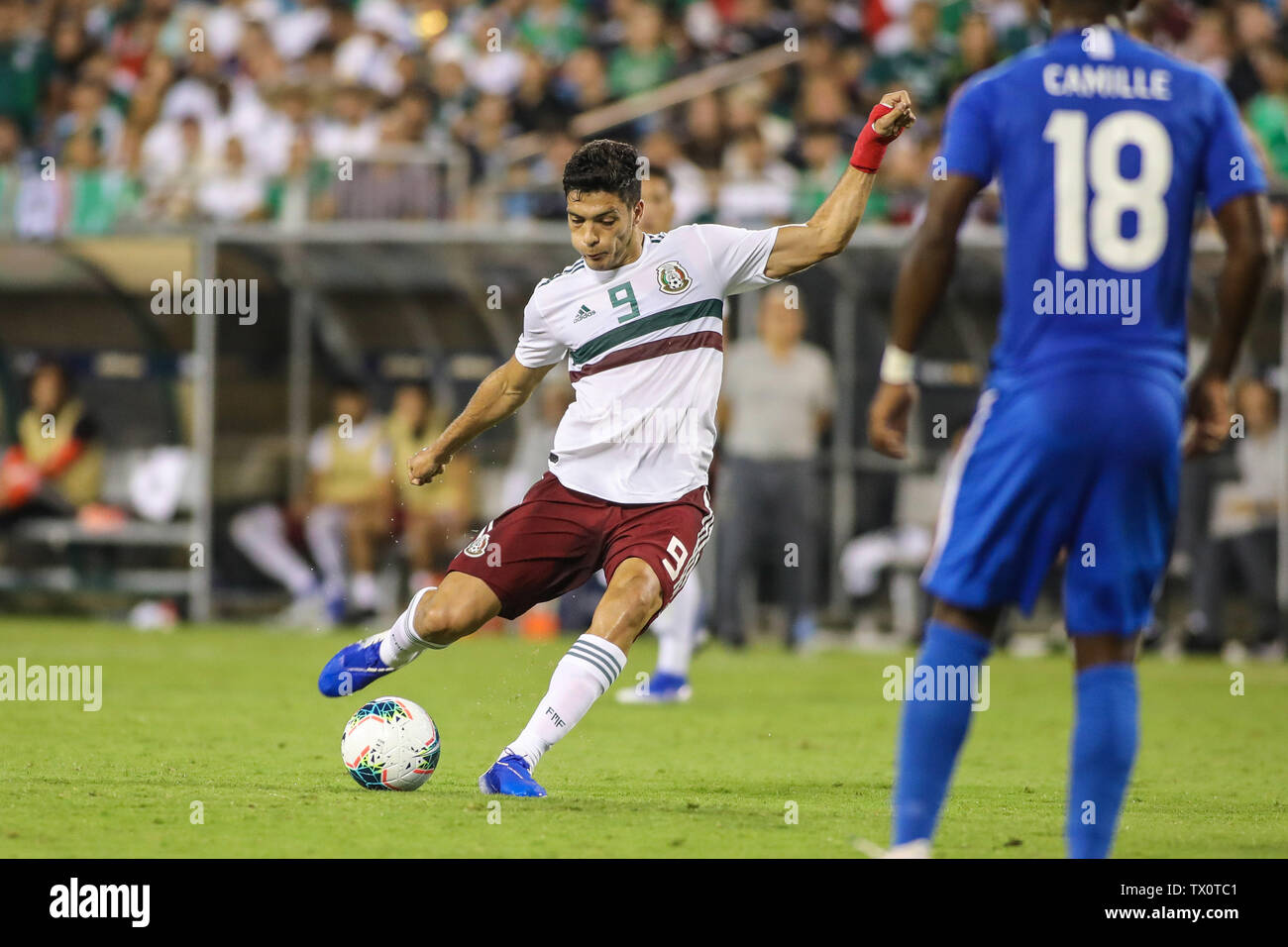 Charlotte, NC, USA. 23rd June, 2019. Mexico forward Raul Jimenez (9) takes a shot on goal during the CONCACAF Gold Cup soccer match between Martinique and Mexico held at Bank of America Stadium in Charlotte, NC. Jonathan Huff/CSM/Alamy Live News Stock Photo