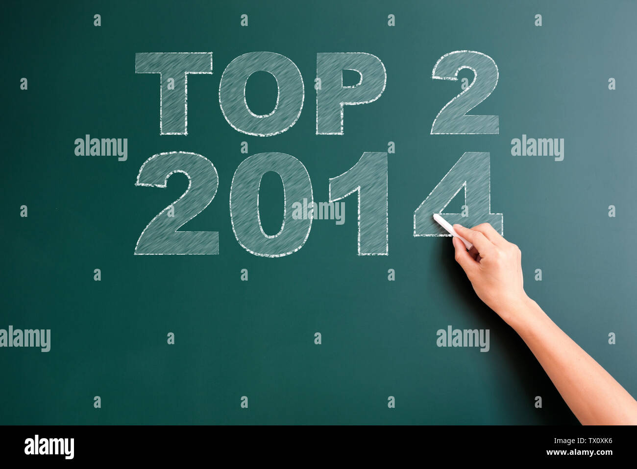 top 2 2014 written on blackboard Stock Photo
