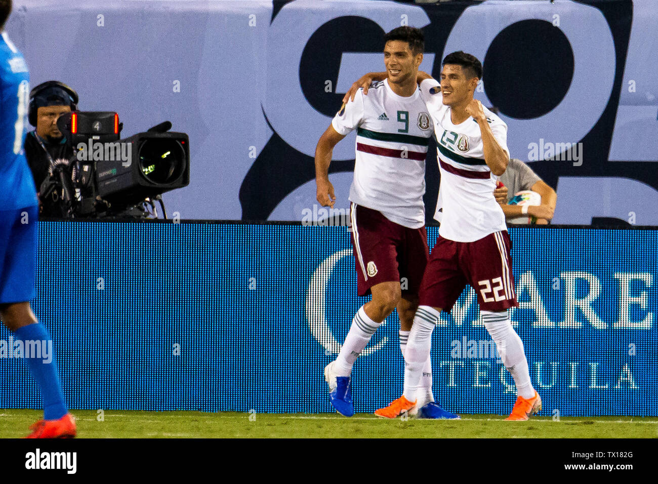 Charlotte, NC, USA. 23rd June, 2019. Mexico forward Raul Jimenez (9) celebrates with defender Jorge Sanchez (22) after scoring in the 2019 Gold Cup match at Bank of America Stadium in Charlotte, NC. (Scott Kinser) Credit: csm/Alamy Live News Stock Photo