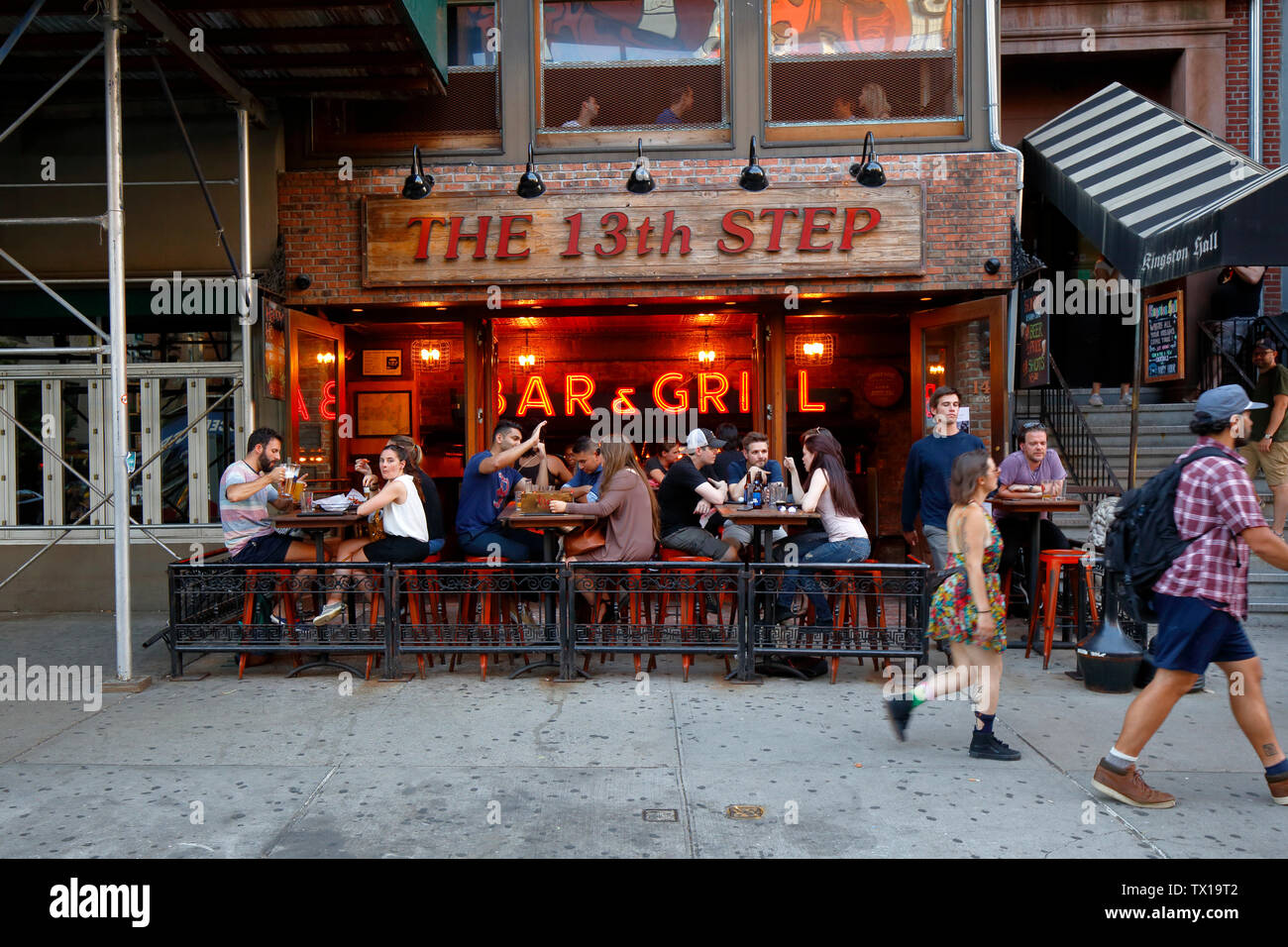 The 13th Step, Kingston Hall, 149 2nd Avenue, New York, NY. exterior storefront of a sports bar in the East Village neighborhood of Manhattan. Stock Photo