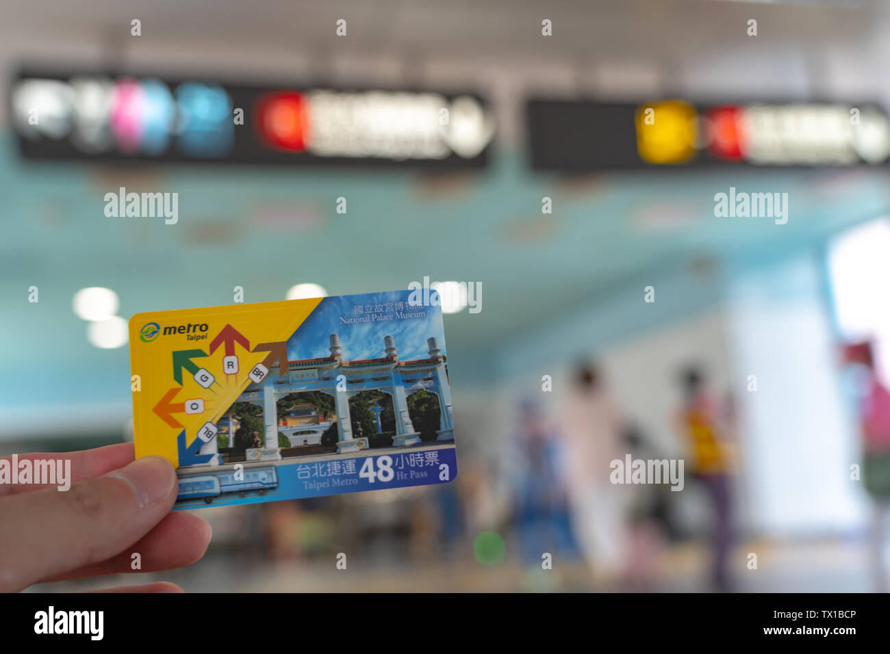 Using subway system in Taipei by 48hr Taipei Metro Pass. Once activated by scanning at the gates, it is valid for un Stock Photo