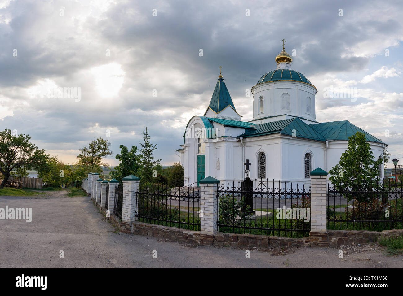 NIKOLAEVKA VILIAGE, ROSTOV REGION, RUSSIA, MAY 12, 2019: The Nikolsky Temple and beautiful clouds in sunny weather Stock Photo