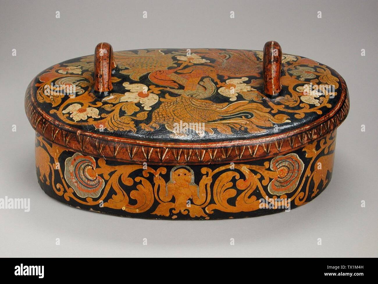 Covered Bowl;  Sri Lanka, circa 1830 Furnishings; Serviceware Terracotta with opaque watercolor 5 1/4 x 11 7/8 x 8 1/4 in. (13.3 x 30.16 x 20.95 cm) Gift of Shirley Day (M.91.159a-b) South and Southeast Asian Art; circa 1830 date QS:P571,+1830-00-00T00:00:00Z/9,P1480,Q5727902; Stock Photo