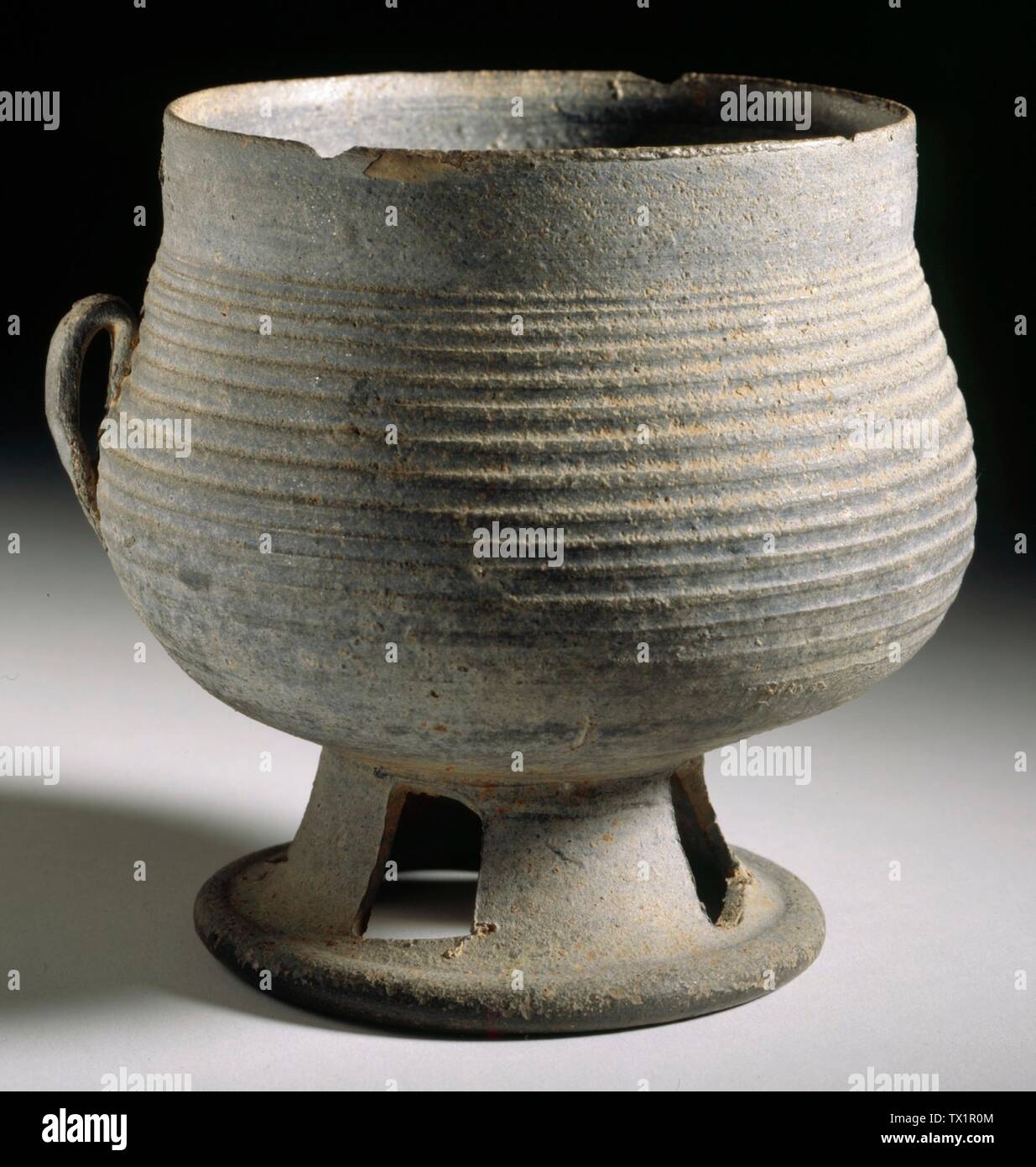 Cup with Handle;  Korea, Korean, Three Kingdoms period, Old Silla kingdom, 57 B.C.-A.D. 668, 5th-7th century Furnishings; Serviceware Wheel-thrown stoneware with combed, modeled, and applied decoration 4 1/8 x 4 1/8 x 4 in. (10.48 x 10.48 x 10.16 cm) Purchased with Museum Funds (M.2000.15.58) Korean Art; 5th-7th century; Stock Photo