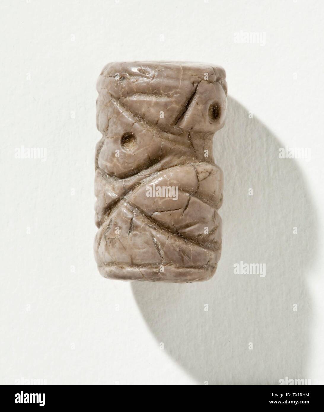 Cylinder Seal; Iran, Mesopotamia or Syria, Transitional period, about 2900-2800 B.C.  Tools and Equipment; seals Gray marble Height:  11/16 in. (1.66 cm); Diameter:  7/16 in. (1 cm) Gift of Nasli M. Heeramaneck (M.76.174.331) Art of the Ancient Near East; between circa 2900 and circa 2800 date QS:P571,+2500-00-00T00:00:00Z/6,P1319,+2900-00-00T00:00:00Z/9,P1326,+2800-00-00T00:00:00Z/9,P1480,Q5727902 B.C.; Stock Photo