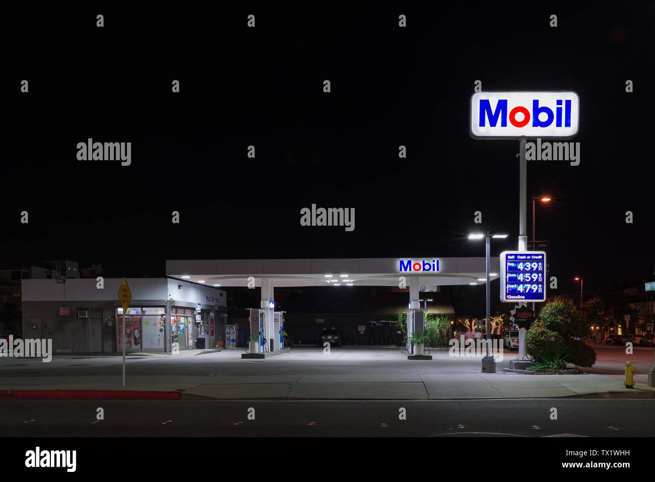 Night image of a Mobil gas station in Pasadena, California. Stock Photo