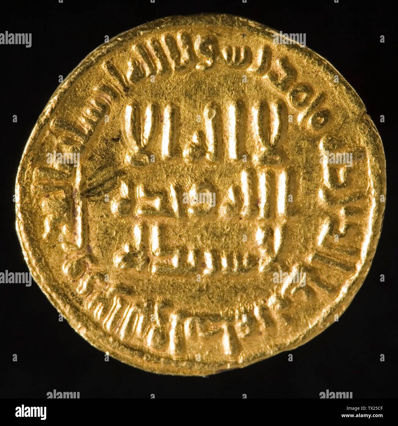 Dinar (image 1 of 2);  Umayyad Caliphate, A.H. 86/705 A.D. Tools and Equipment; coins Gold Diameter:  3/4 in. (1.91 cm); Weight:  0.15 oz (4.27 g) Purchased with funds provided by the Joan Palevsky Bequest (M.2006.143.5) Islamic Art; A.H. 86/705 A.D.; Stock Photo