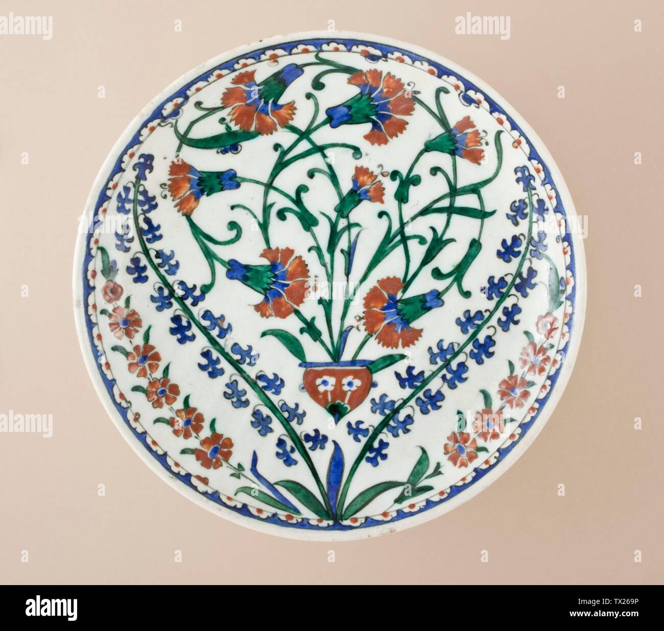 Dish;  Turkey, Iznik, 1560-1585 Furnishings; Serviceware Fritware, underglaze-painted Height:  1 15/16 in. (5 cm); Diameter:  11 in. (28 cm) Purchased with funds provided by Camilla Chandler Frost (M.2006.130) Islamic Art; between 1560 and 1585 date QS:P571,+1550-00-00T00:00:00Z/7,P1319,+1560-00-00T00:00:00Z/9,P1326,+1585-00-00T00:00:00Z/9; Stock Photo
