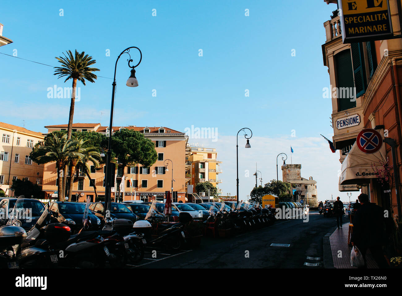 Rapallo, Italy - 03 27 2013: moped, scooters. cars on the parking. View ...