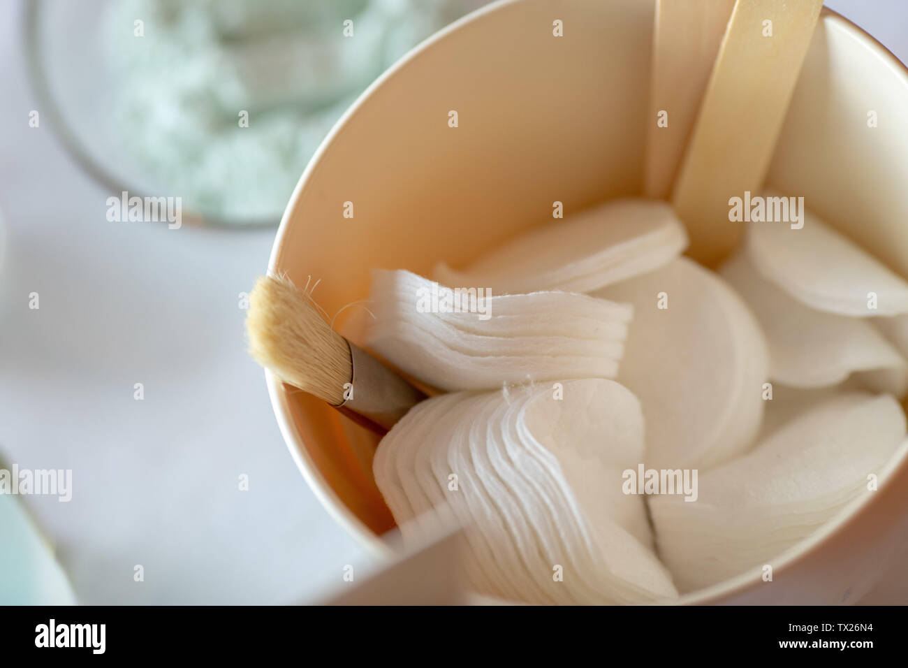 Cotton pads for face in plastic bowl Stock Photo