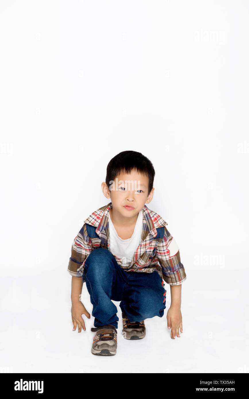 isolated naughty boy on white background Stock Photo - Alamy