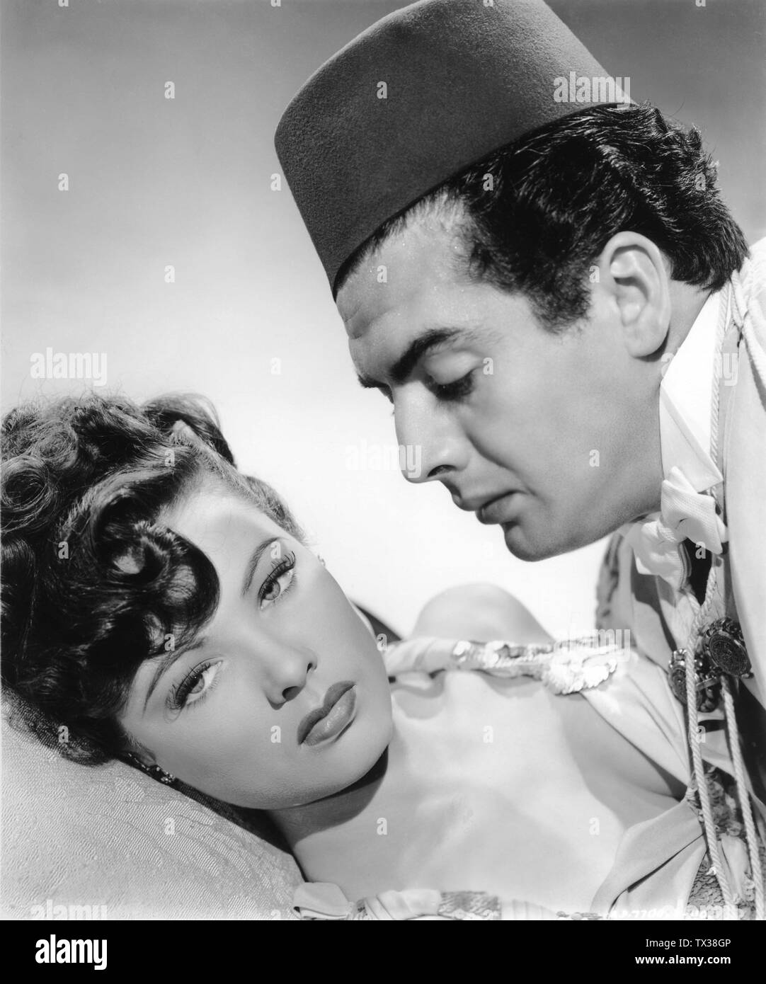 GENE TIERNEY as Poppy and VICTOR MATURE Doctor Omar in THE SHANGHAI GESTURE 1941 director Josef von STERNBERG producer Arnold Pressburger Films / United Artists Stock Photo