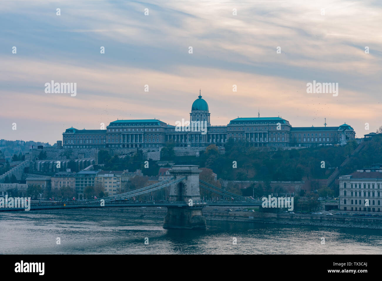Sunset view of the famous Széchenyi Chain Bridge with Buda Castle at Budapest, Hungary Stock Photo