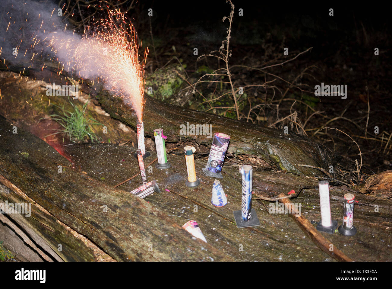 Fireworks on log Stock Photo Alamy