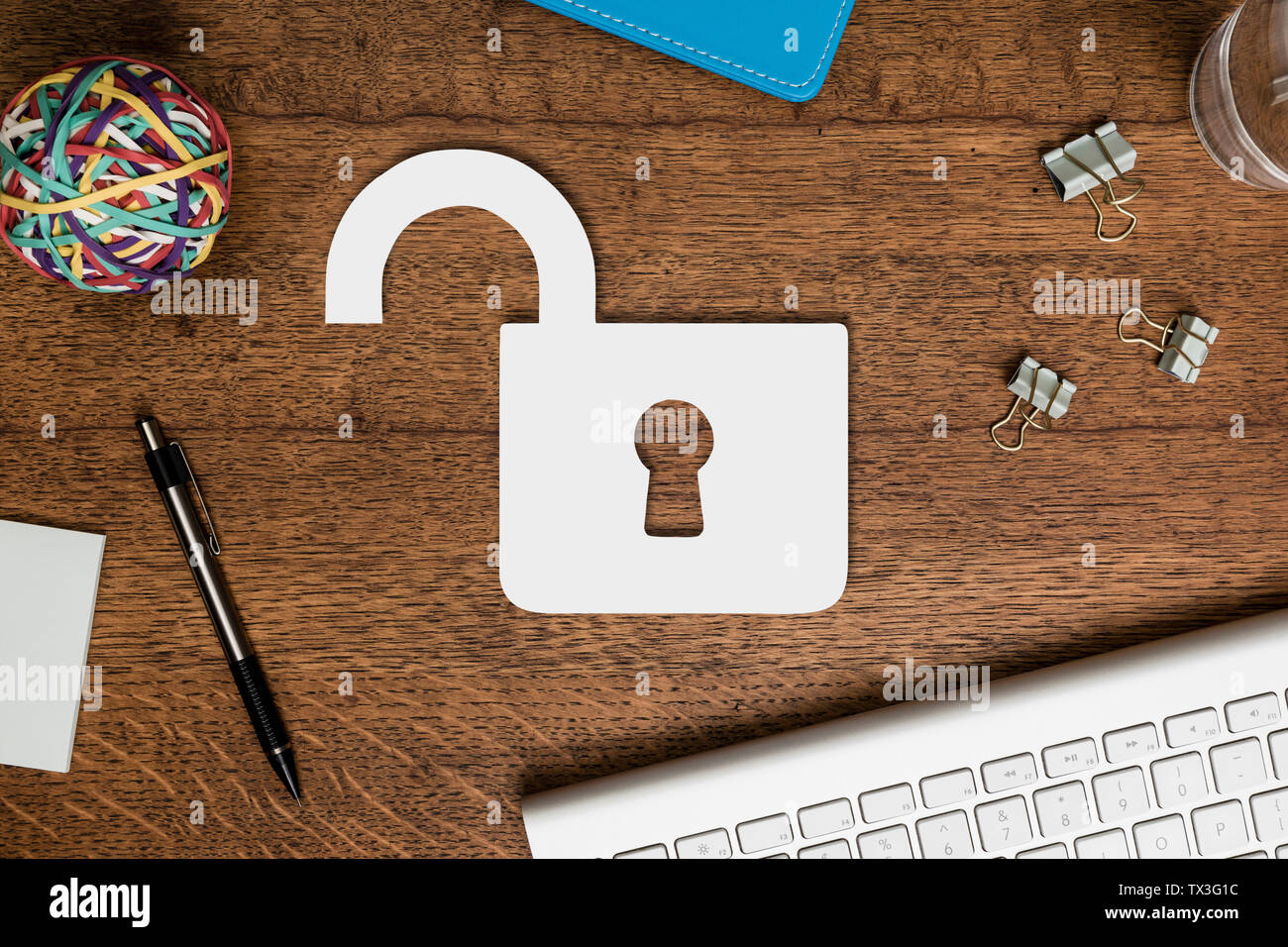 View from above paper padlock on wooden desk Stock Photo