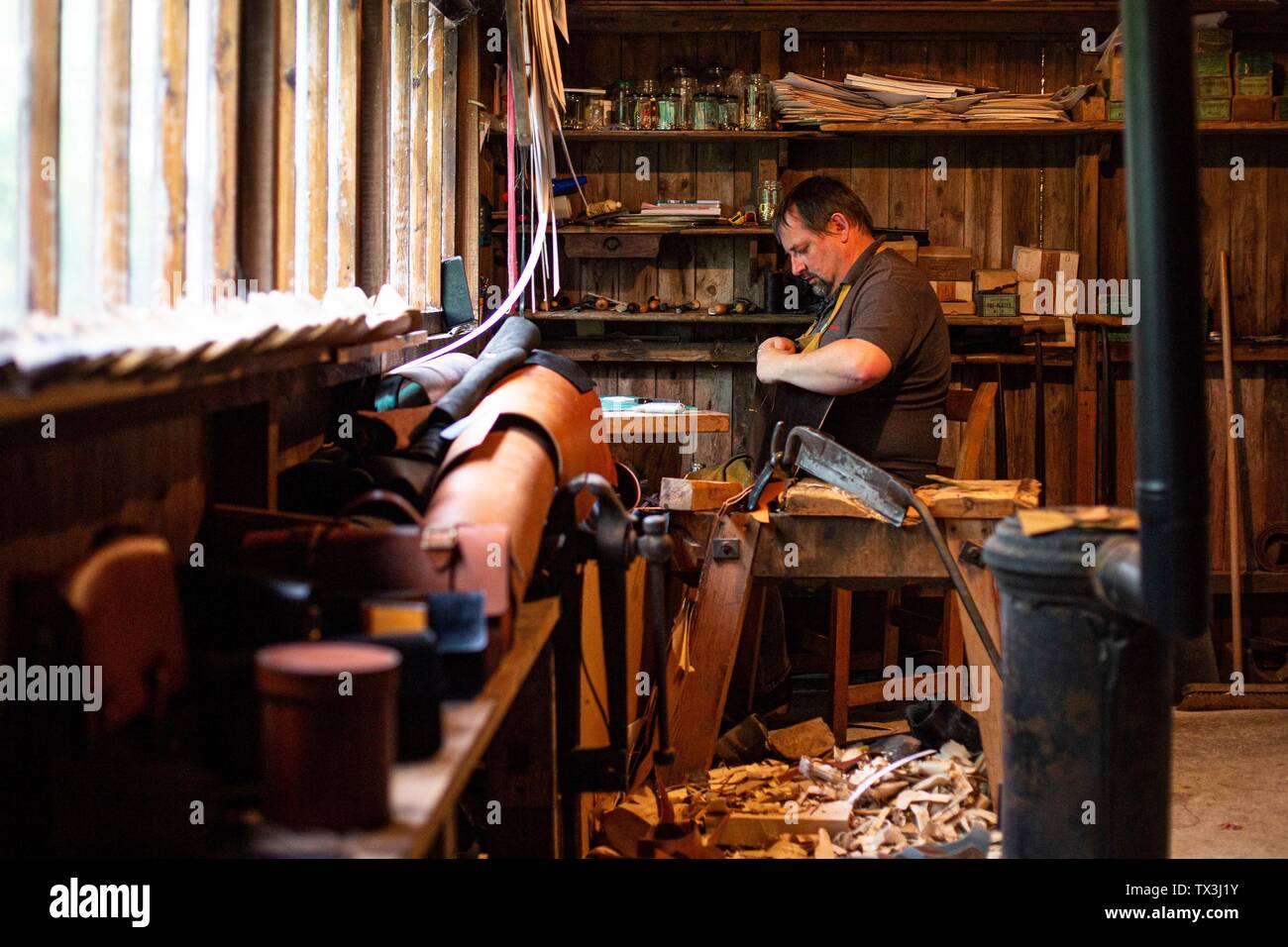 A traditional clogmaker at work at St Fagan's Museum, Cardiff, June