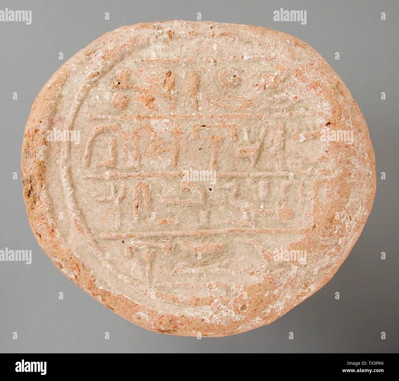Funerary Cone of Wsr-hat (image 2 of 2); Tools and Equipment; cones Terracotta Height:  3 15/16 in. (10 cm); Diameter: 3 1/8 in. (8 cm) Gift of Jerome F. Snyder (M.80.202.55) Egyptian Art; Stock Photo