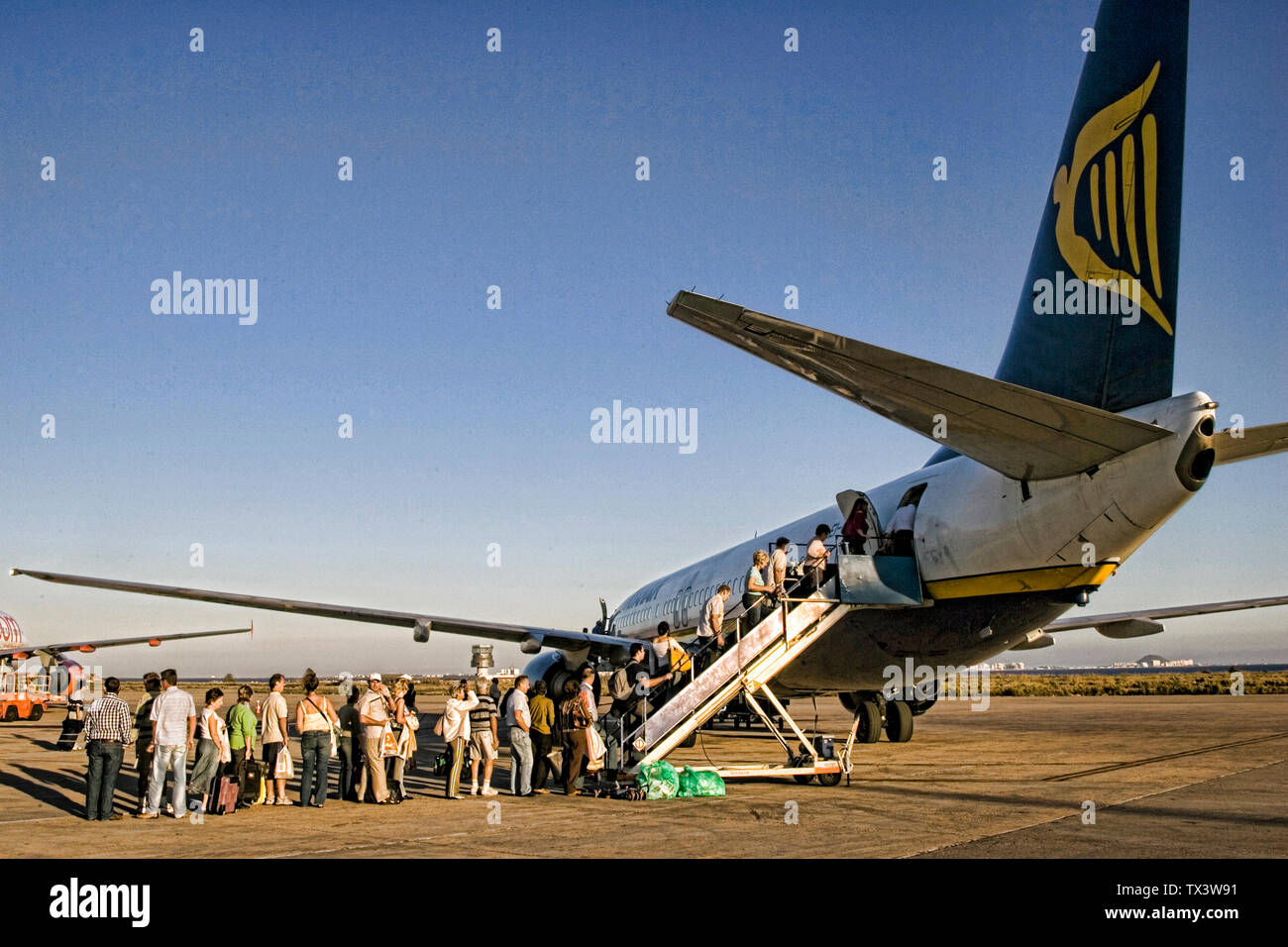 Passengers boarding Ryanair plane Murcia Spain Stock Photo