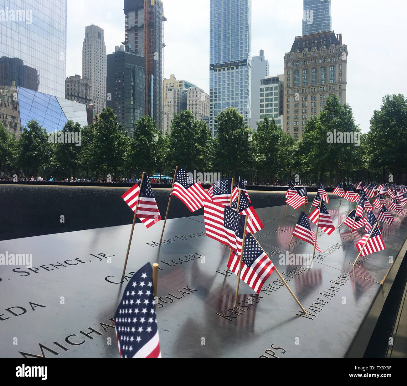 4th July memorial flags at the National 9 11 Memorial & Museum, New York City, New York, USA Stock Photo