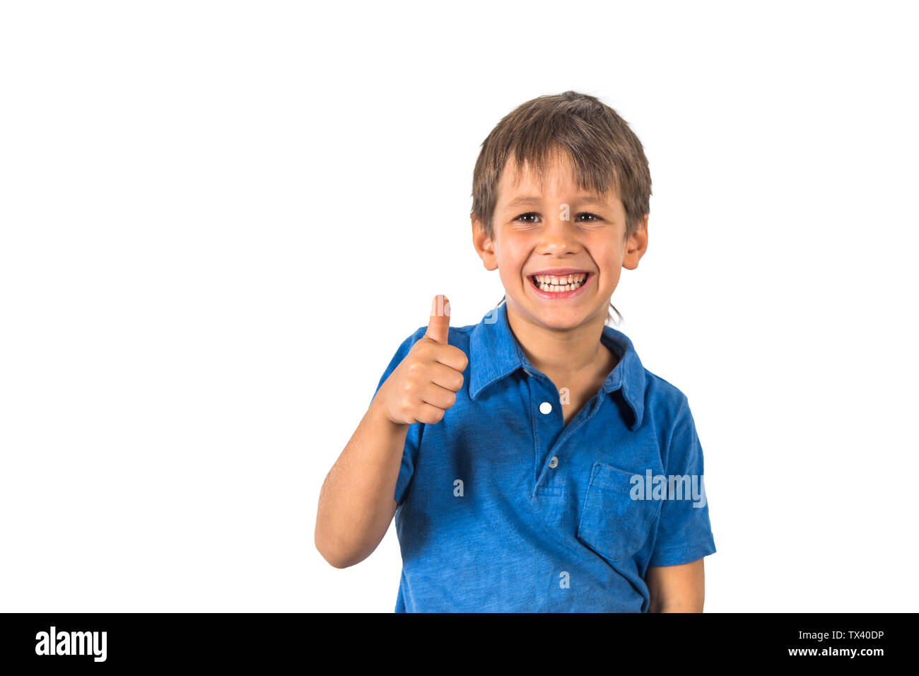 Child boy showing thumbs up on white background Stock Photo - Alamy