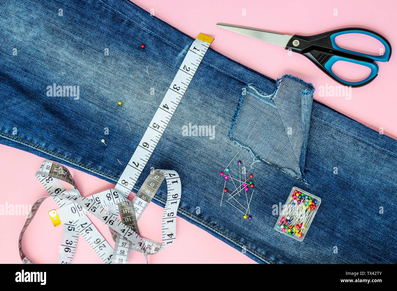 jeans with holes below the knee