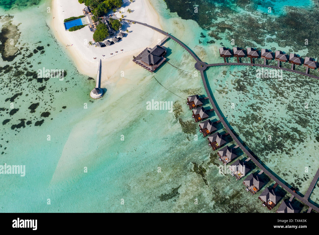 Maldives, South Male Atoll, aerial view of resort with bungalows on island Olhuveli Stock Photo