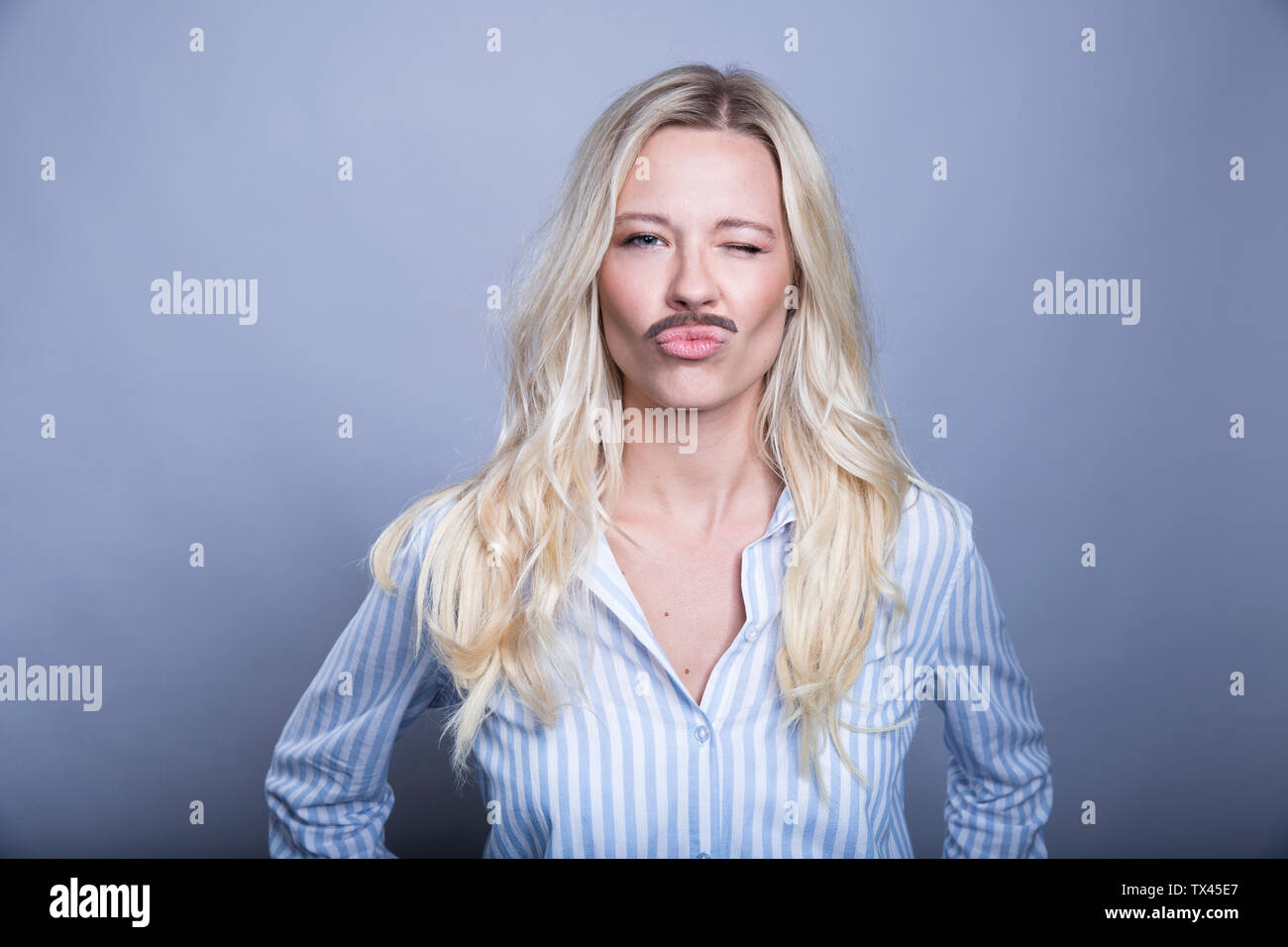 Attractive woman fake moustache hi-res stock photography and images - Alamy