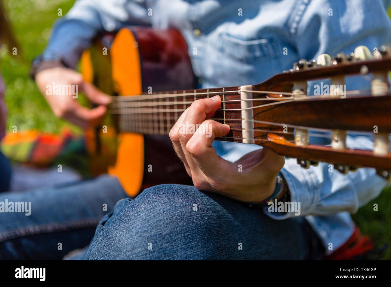 Close up of person playing a guitar hi-res stock photography and images ...