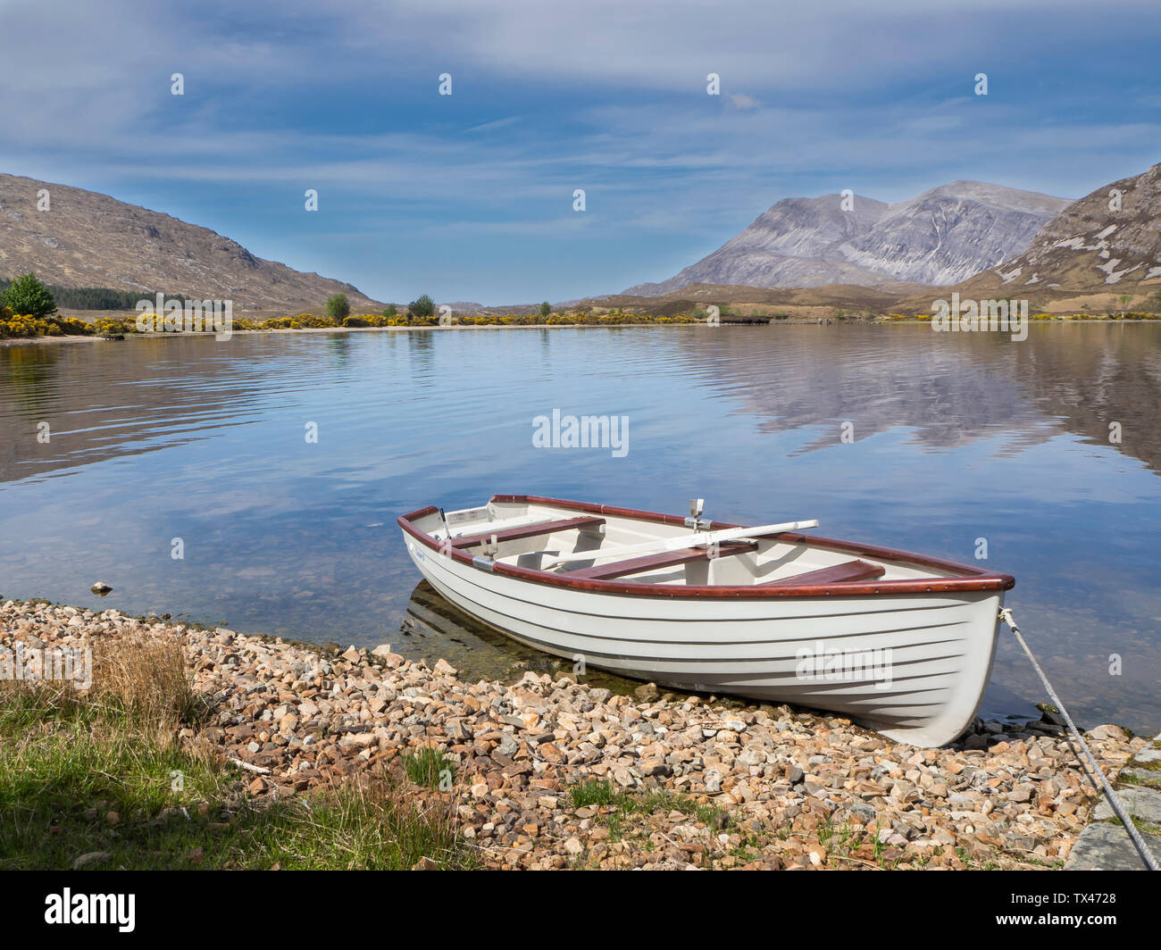 Great Britain, Scotland, Northwest Highlands, Achfary, mountain landscape with lake and boat Stock Photo