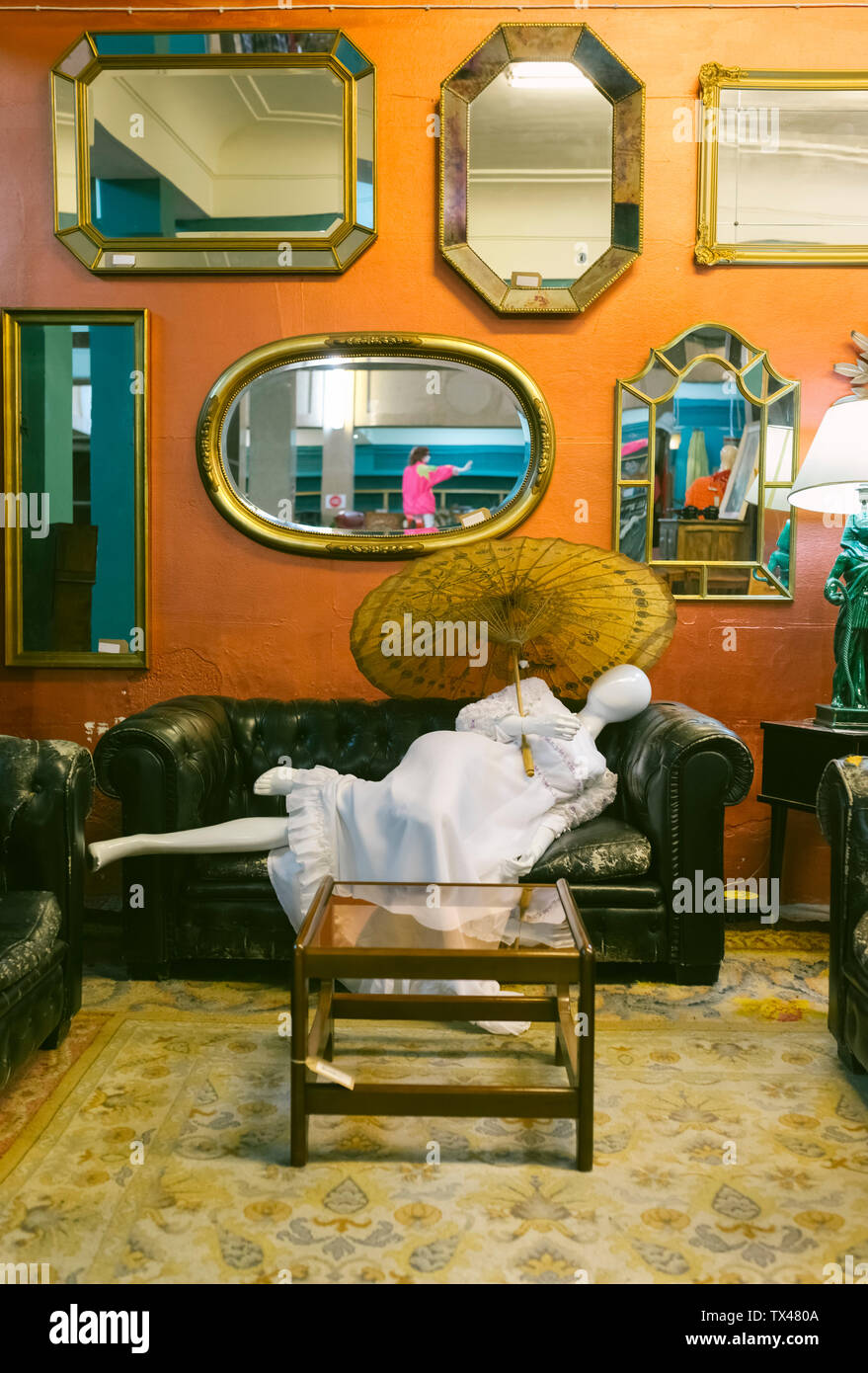 Interior of a vintage furniture and clothing shop Stock Photo