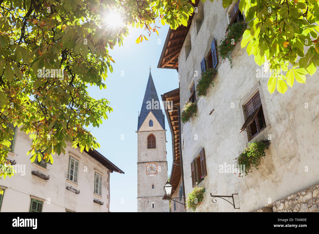 Italy, South Tyrol, Margreid, South Tyrol Wine Route, village view with church spire Stock Photo