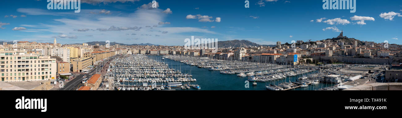 France, Marseille, old harbour with the Notre Dame de la Garde, panoramic view Stock Photo