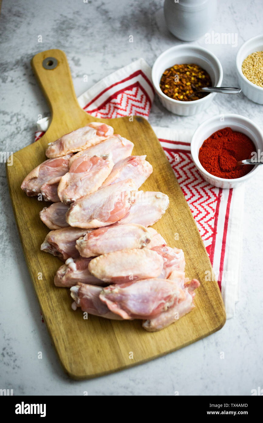 Preparing of spicy chicken wings Stock Photo