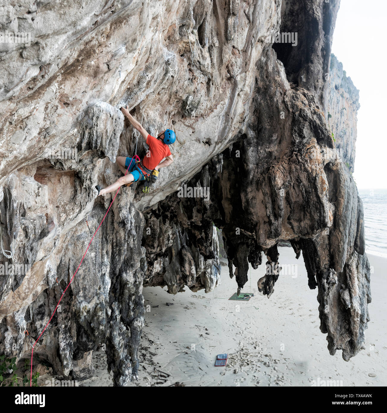 Thailand, Krabi, Lao liang island, climber in rock wall Stock Photo