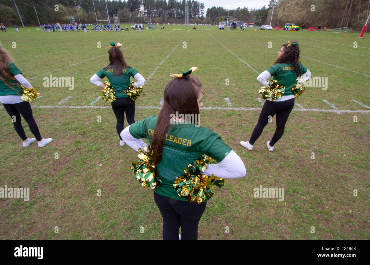 Bury Saints american football cheerleaders on the sidelines Stock Photo