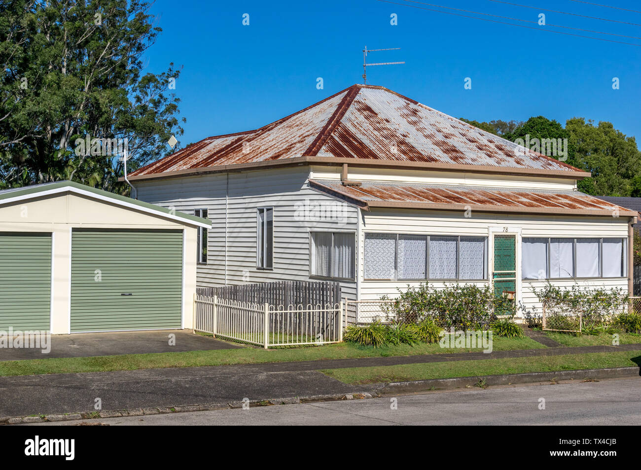 Old Australian house with wooden sidings and iron roof Stock Photo