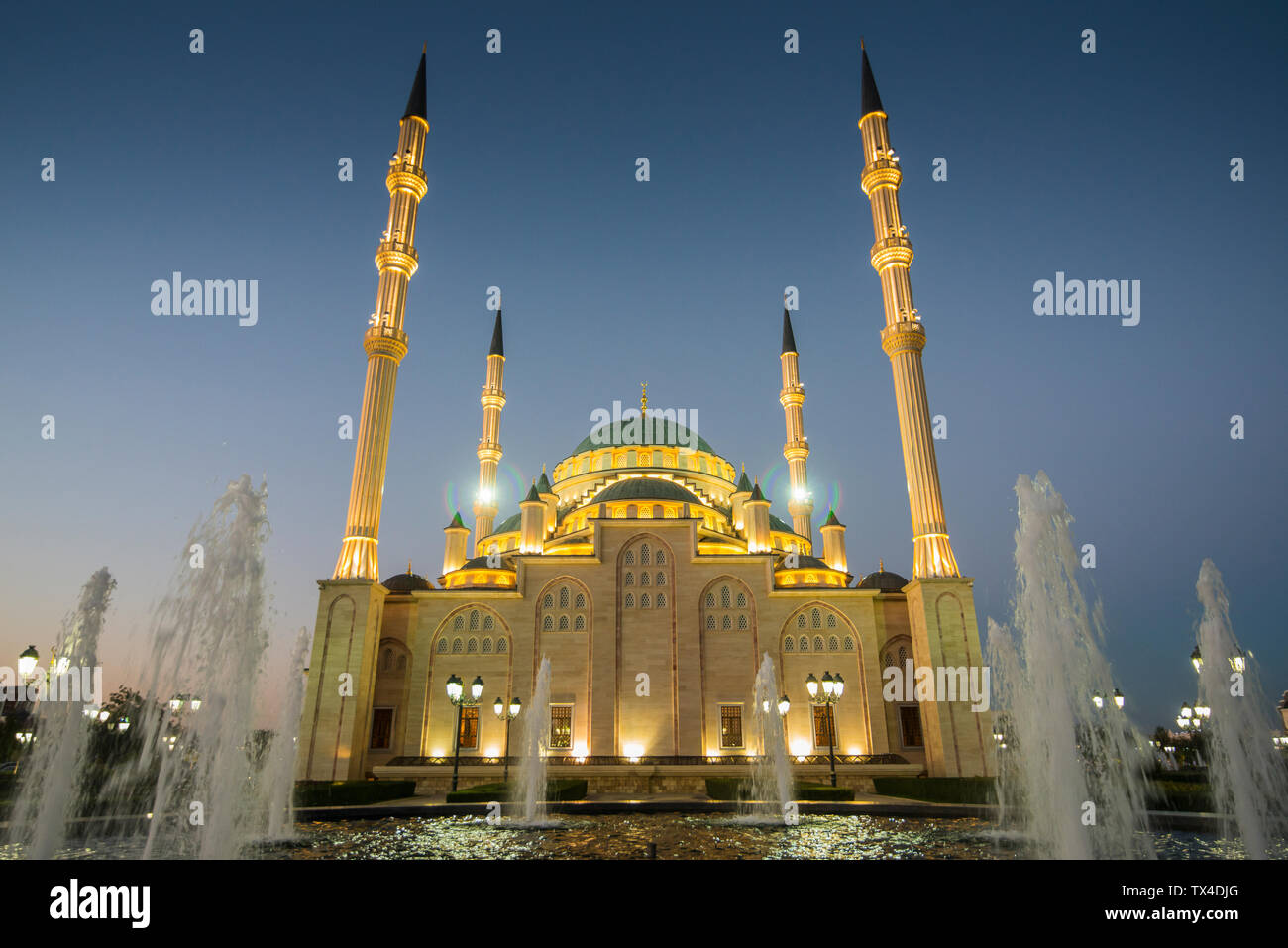 Akhmad Kadyrov Mosque after sunset, Grozny, Chechnya Stock Photo