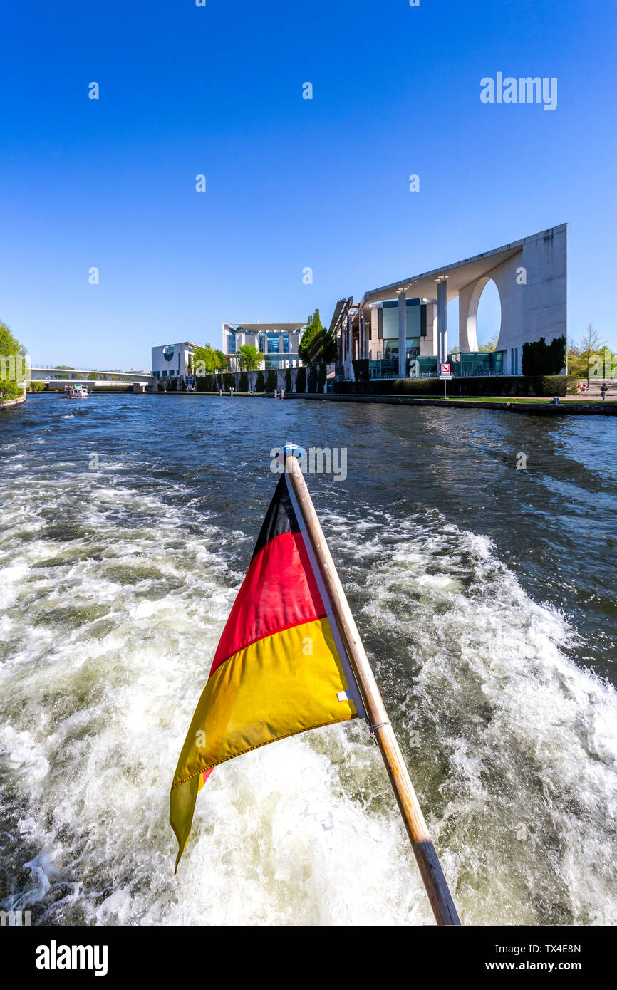 Germany, Berlin, Chancellery and German flag on excursion boat on River Spree Stock Photo