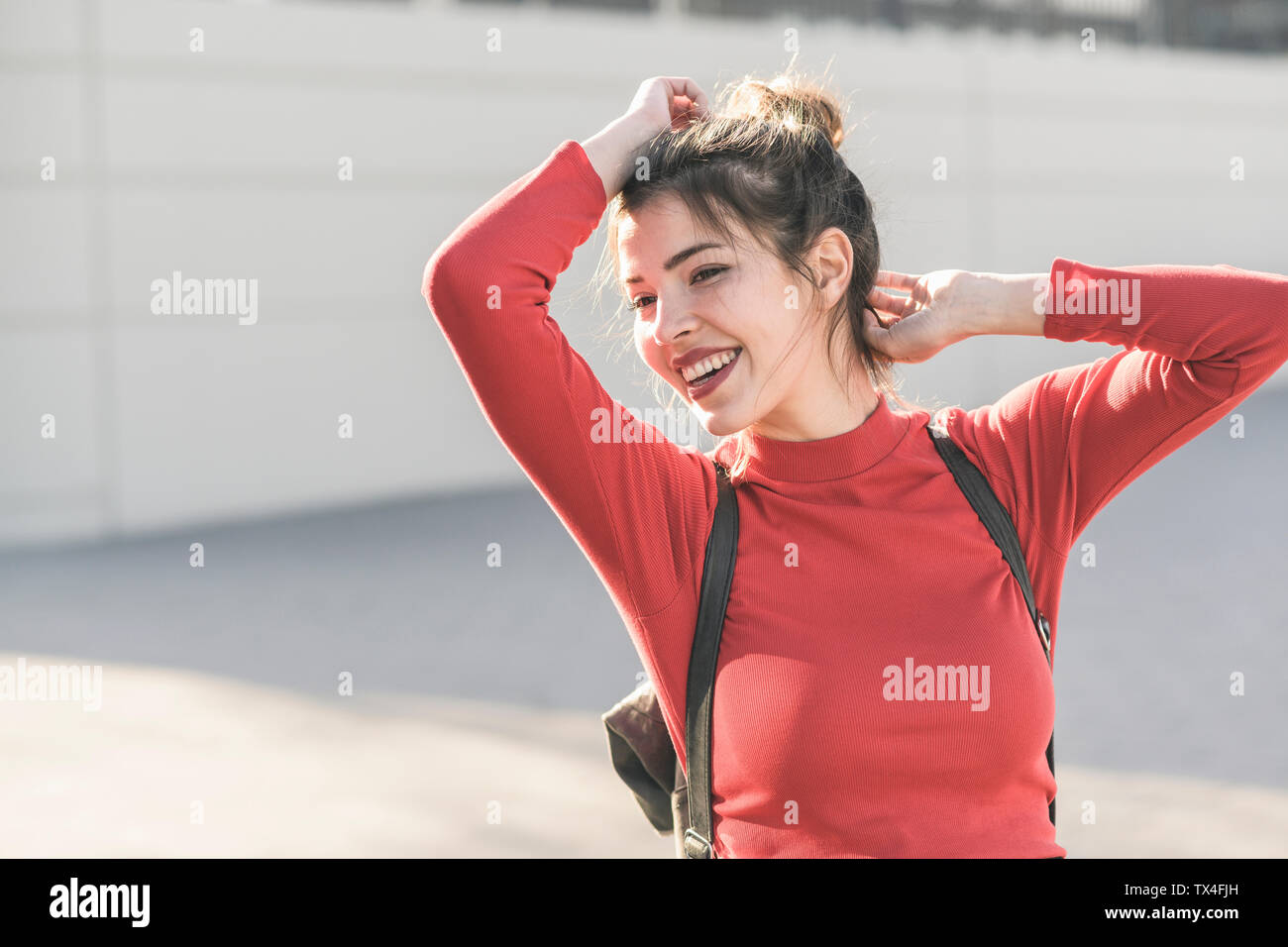 Happy young woman outdoors hi-res stock photography and images - Alamy