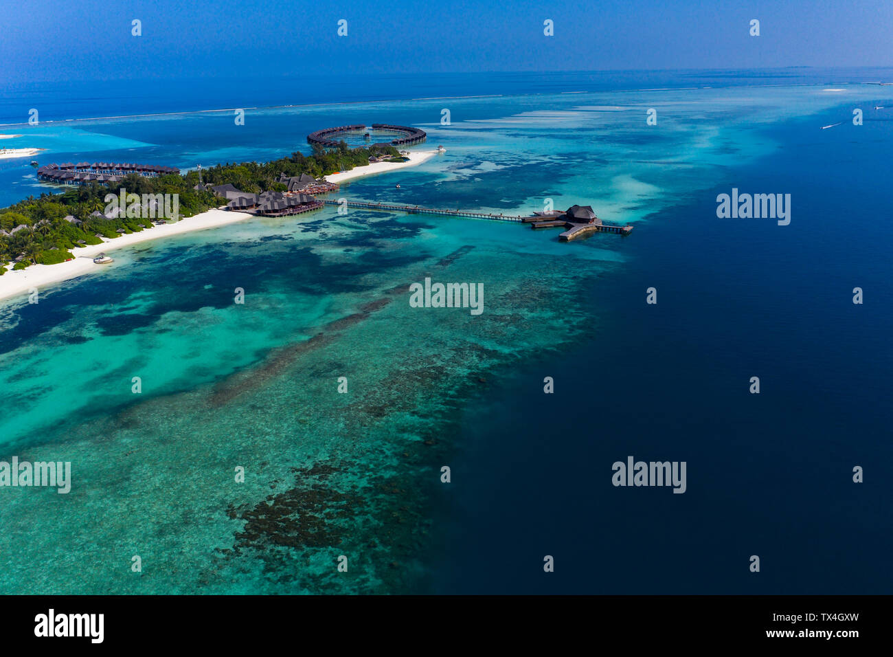 Maledives, South Male Atoll, lagoon of Olhuveli with sandy beach and water bungalow, aerial view Stock Photo