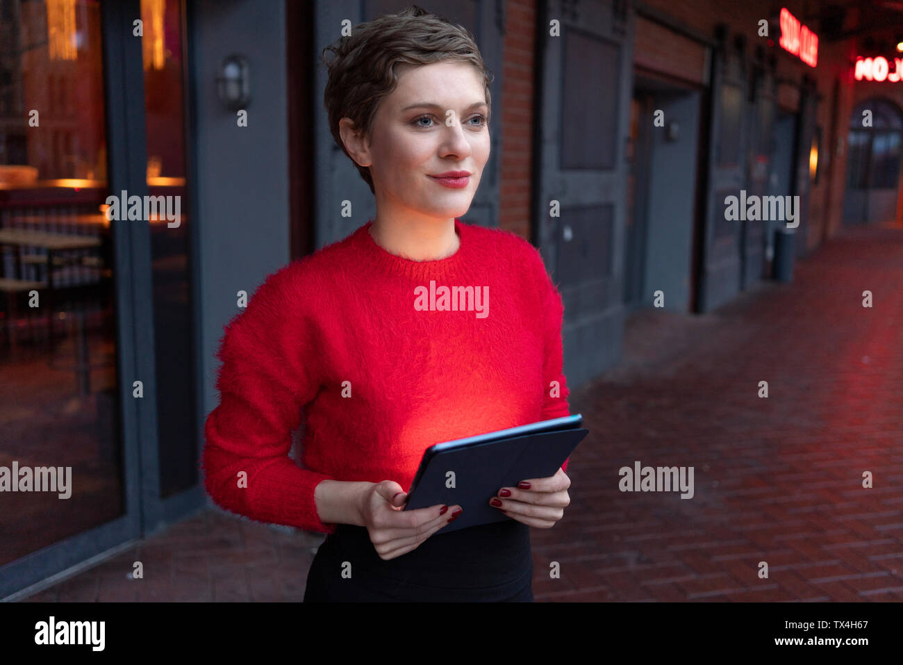 Portrait of confident businesswoman  with digital tablet outdoors Stock Photo