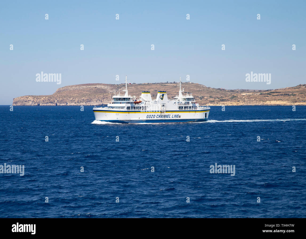 The Malta to Gozo ferry in the Gozo Channel Stock Photo