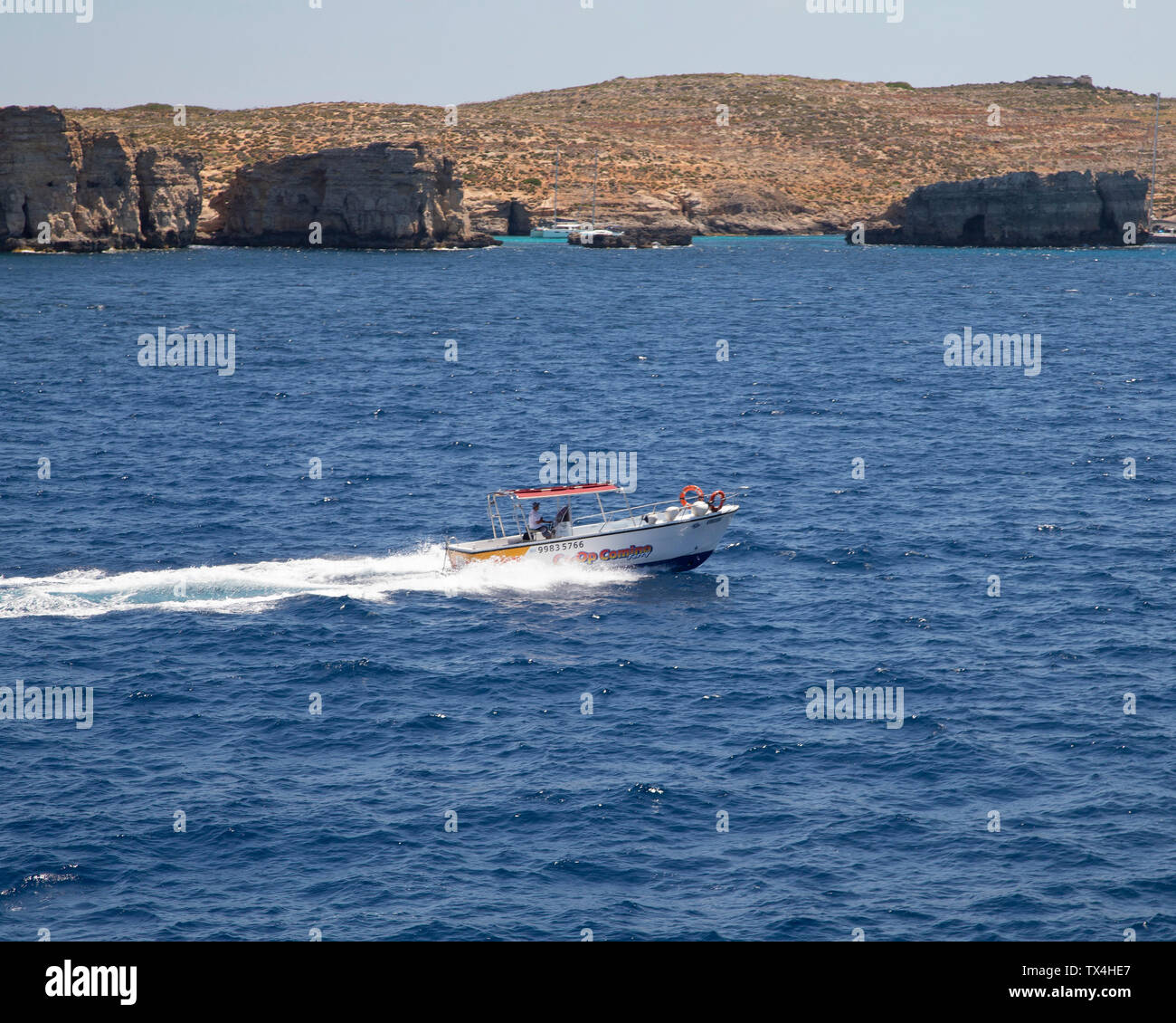 One of the ferries connecting Comino, Gozo, and Malta Stock Photo