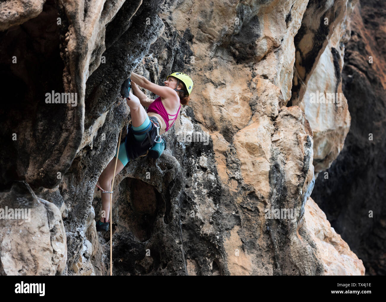 Mature woman free climbing hi-res stock photography and images - Alamy
